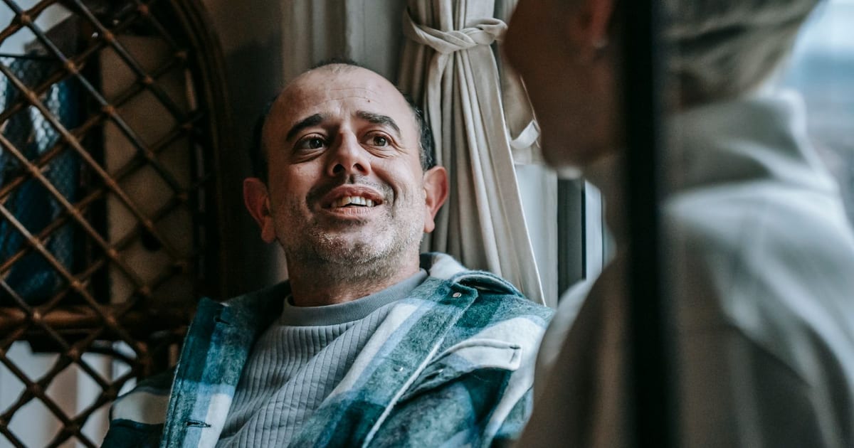 Man in a warm, relaxed conversation